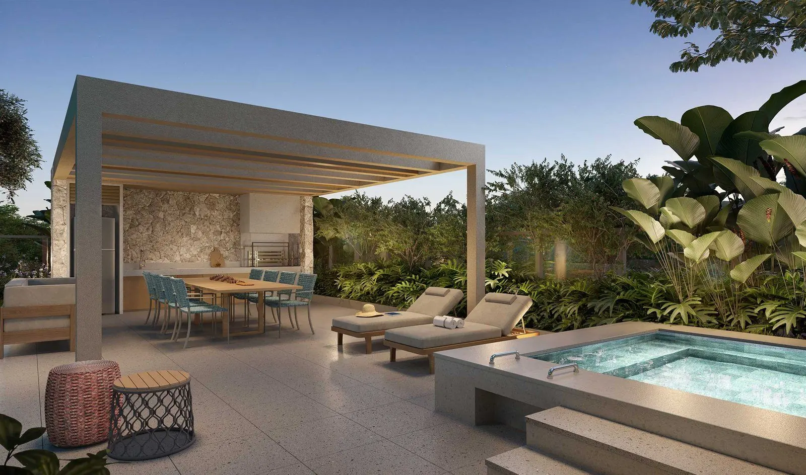 O VIP space sob a pérgola, com a mesa de jantar, a cozinha externa e a hidromassagem ao lado.