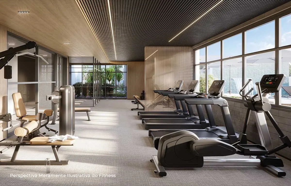 O fitness, com as esteiras voltadas para a parede de vidro e o jardim.