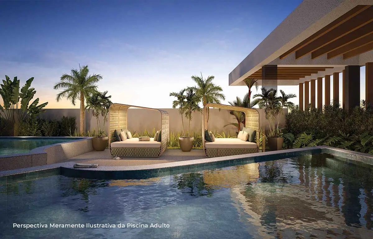 A piscina adulto, com as espreguiçadeiras na borda e a torre ao fundo.