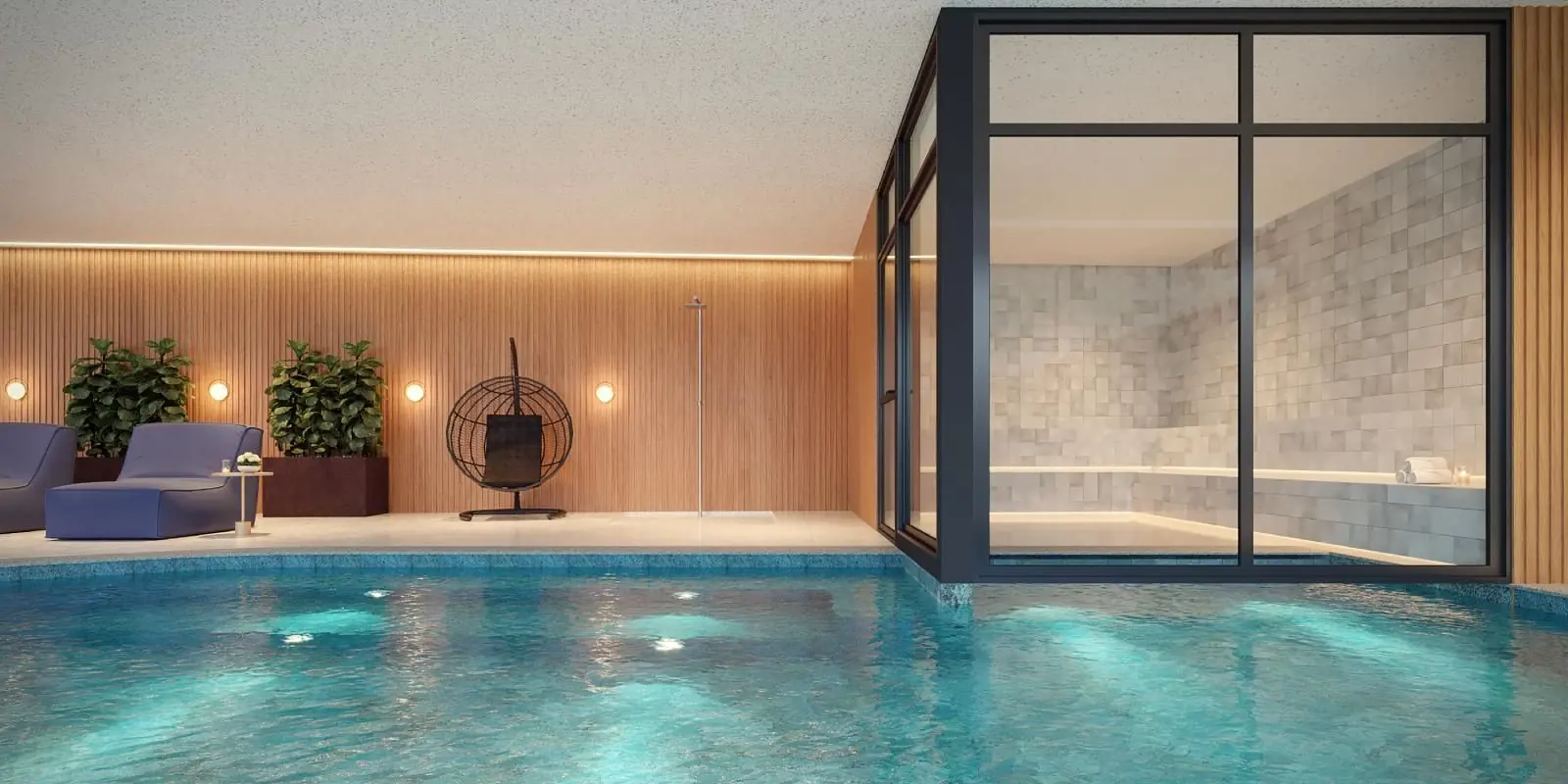 A piscina da sauna, com parede de pedra, cadeira de balanço e a janela para o jardim.